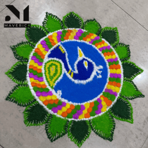 blue peacock rangoli design with green leaf on diwali